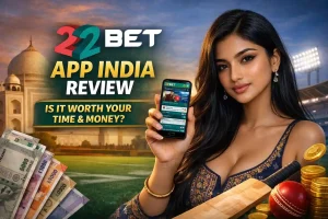 Attractive Indian woman in a stylish embroidered outfit holding a smartphone displaying the 22Bet app, set against a vibrant backdrop of the Taj Mahal and a cricket stadium, with Indian currency, coins, a cricket bat, and bold promotional text reading ‘22BET APP INDIA REVIEW – Is it worth your time & money?