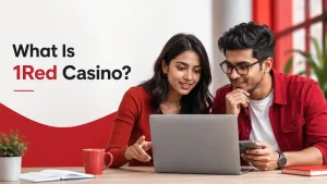 Professional featured image showing a young Indian woman and man reviewing information on a laptop, with a red editorial theme and the text “What Is 1Red Casino?”