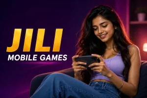 A smiling young indian woman sits on a couch playing games on her smartphone in a neon-lit room. Large yellow and white text on the left reads “JILI MOBILE GAMES” against a purple background.