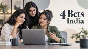Three Indian Gen Z women reviewing information together on a laptop for a 4 Bets India platform guide.